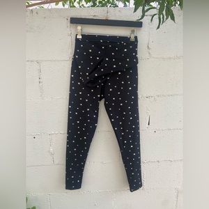 NWOT:Onzie High Rise Legging+Sutra Bra set, Black/Gold stars print, Size S/M.